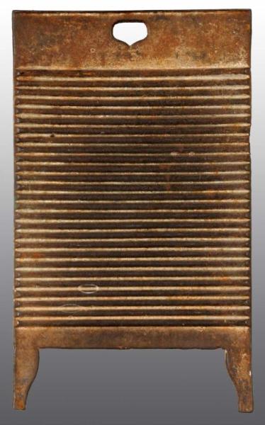 CAST IRON WASH BOARD WITH HEART HANDLE